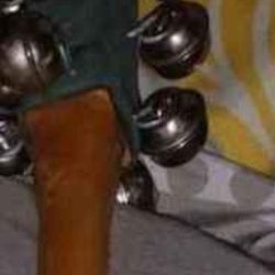 Bells And Wooden Stick Instrument 