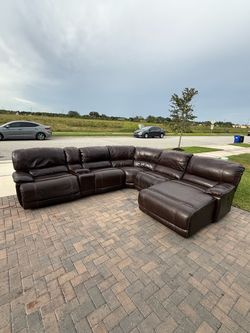 Leather reclining sectional- delivery available