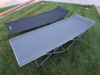 Two folding camping cots