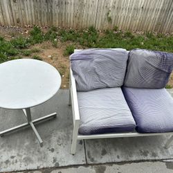 Patio Furniture, White Frames, And Blue Cushions