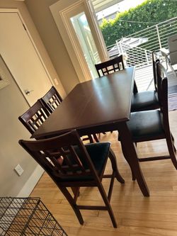 Solid Wood Counter-Height Table & 6 Chairs – $350