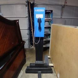 Charge-a-Call public telephone