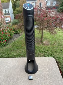 Tower fan w/remote. Great quality and brand, Honeywell.
