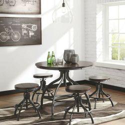 [HOT DEAL] Odium Counter Height Dining Table and Bar Stools (Set of 5)
by Ashley