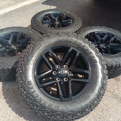 2024 NEW OEM GMC TIRES AND WHEELS CHEVY SILVERADO TRAIL BOSS 18 INCH TIRES GOODYEAR WRANGLER TERRITORY NEW  100  % DOT 4923 $ 1799 