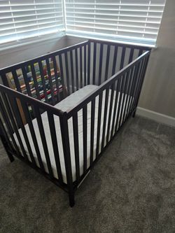 Used Delta children crib with mattress