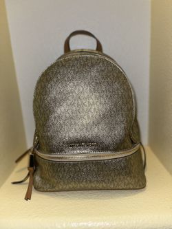 NEW Rhea michael-kors-gold-backpack