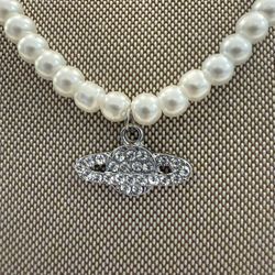 Elegant Fuax Pearl Necklace with Silver Saturn Pendant