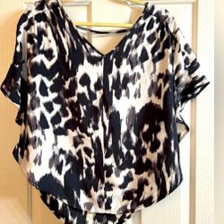 Express Woman’s Silk Leopard Print Batwing Blouse, Size Medium. 