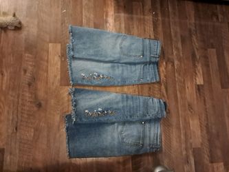 Jean shorts with floral blue white and tan