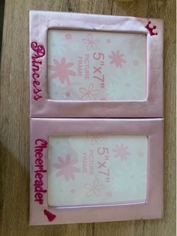 two pink princess photo frames