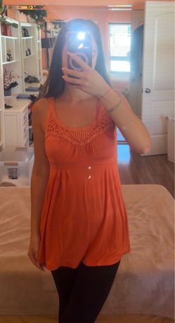 Orange women's tunic with crochet detail