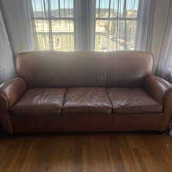 Comfortable brown leather sofa 