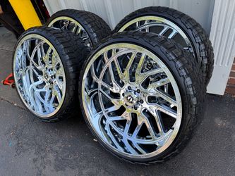 NEW 26x12 TIS chrome wheels wrapped in RBP RT tires. 305/30r26 same as a 33