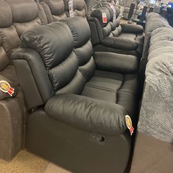 Maverick Black motion Sofa And Loveseat