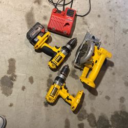 DeWalt Saw And Two Drills With A Milwaukee Battery And Charger And Also You Can Use 20 amp DeWalt Batteries 