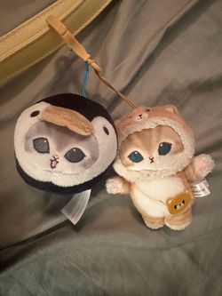 Two Mofusand plushies