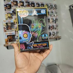 Signed Gabriel Iglesias Black Light Pop Figure.