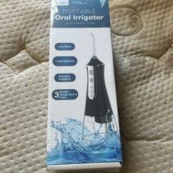 Portable Oral Irrigator 