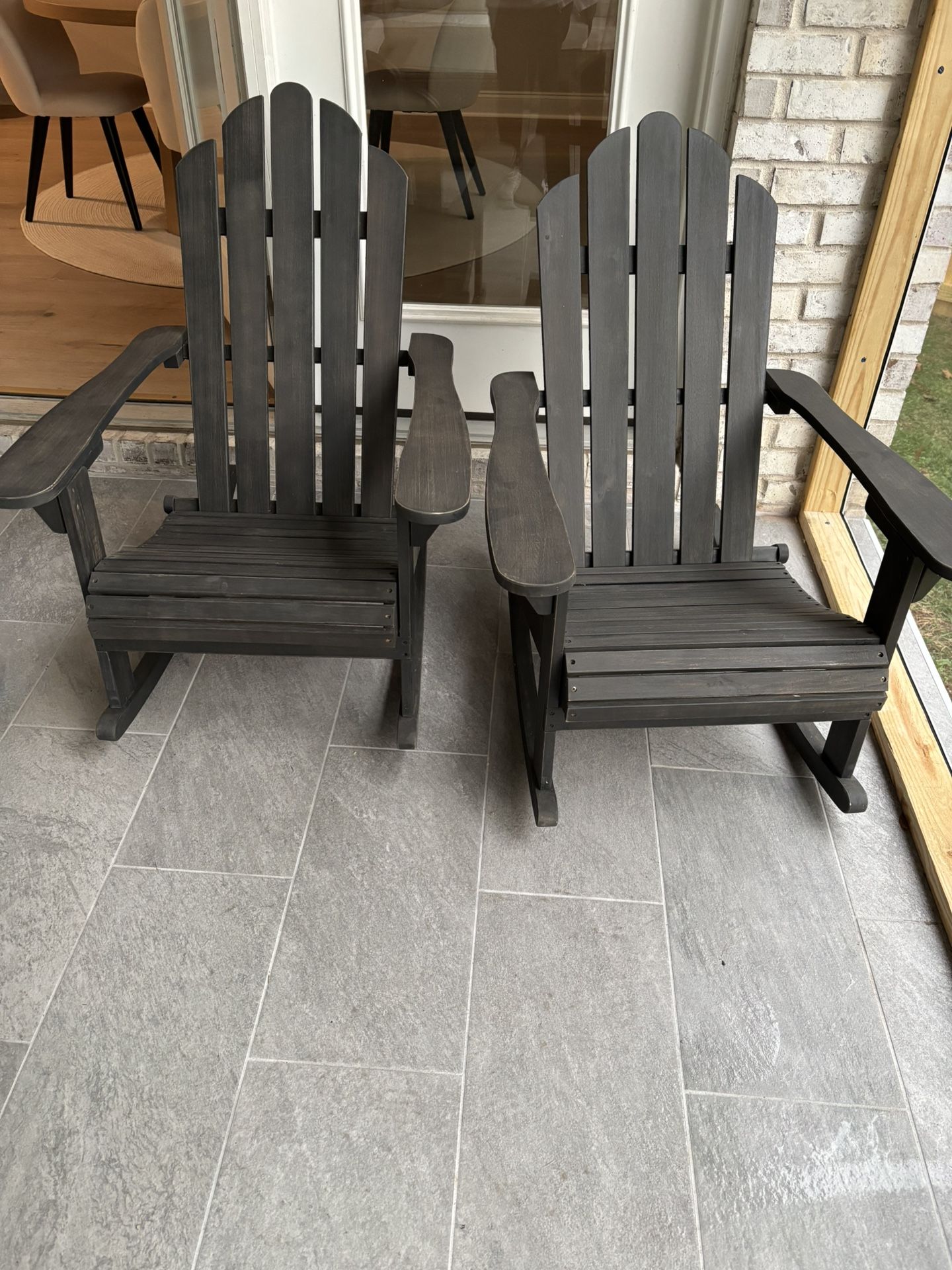Two Gray Adirondack Rocking Chairs