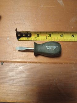 Pittsburgh screwdriver, specifically a stubby flathead screwdriver with a 1/4" tip and a 1 1/2" shank length
