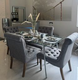 Glass Dining Table with 4 Gray Tufted Chairs