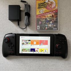 Nintendo Switch System / Console - Includes 2 in 1 Game And Charger power cord . The Nintendo switch has scratches on the front and back and missing l