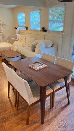 Walnut dining table and chairs