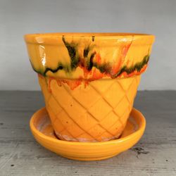 Vintage MCM pottery drip glaze planter pot with attached drip plate. 5 1/2” tall x 6” wide across the top.  No chips.