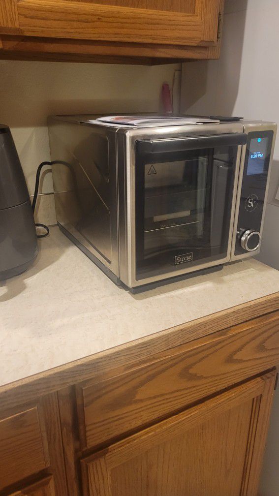 Suvie Kitchen Robot Model: S020M with extra Mitts and Pans for Sale in Las  Vegas, NV - OfferUp
