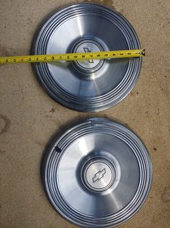 Two chevy wheel Cover