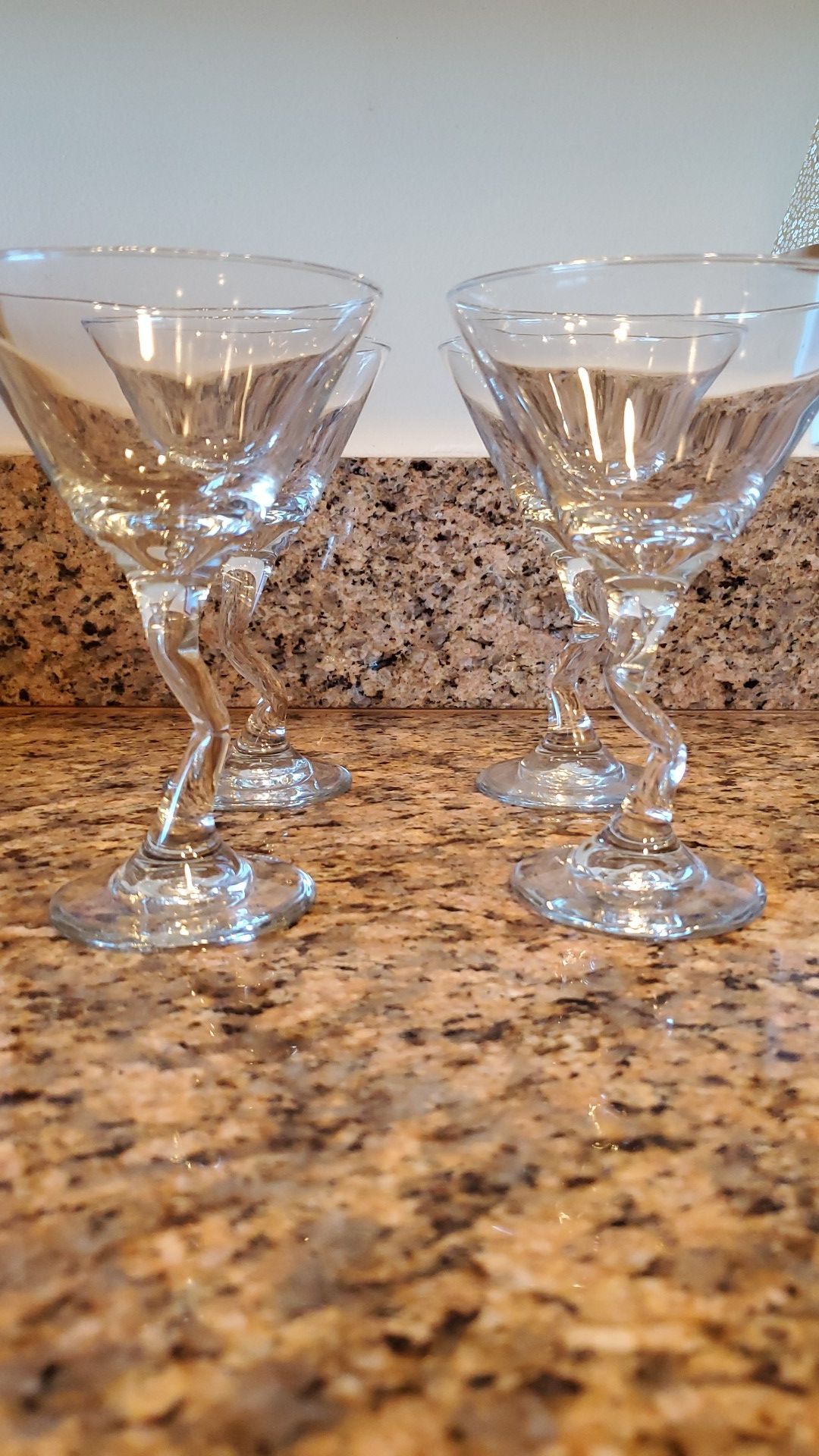 4 cocktail glassware with a zigzag stem.