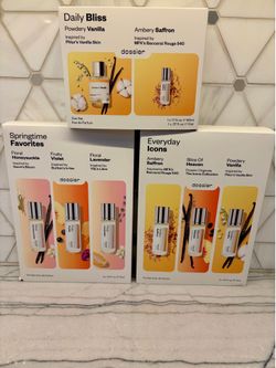 Dossier perfume collection includes three distinct gift set options. Choose from Daily Bliss set with one 50ml bottle of Powdery Vanilla and one 11ml 