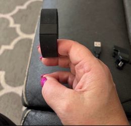 Fitbit Digital Wristwatch with a Buckle Band