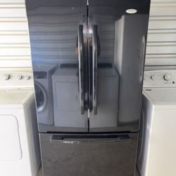 Black Whirlpool Refrigerator And Freezer