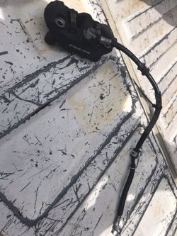 Suzuki front brake caliper