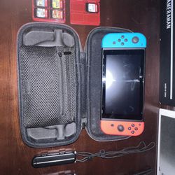 NINTENDO SWITCH WITH 7 GAMES 