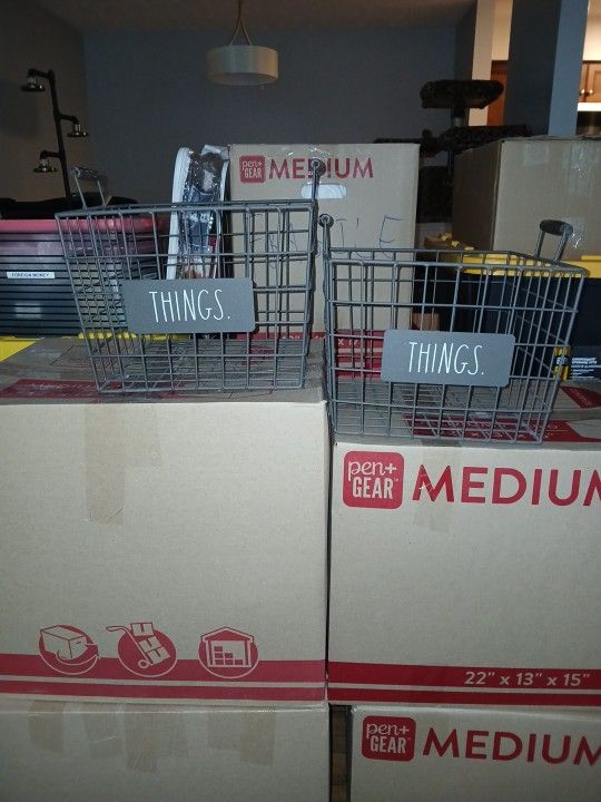 Two Wired Baskets With Handles Labled Things