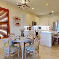 Round Wood Kitchen Table with Built In Leaf plus Chairs