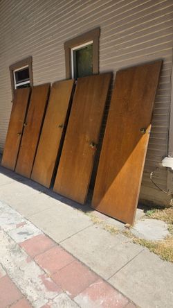 Wood door/ puertas tengo 6  / 30x80 Each $20