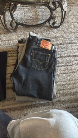 stack of 6 Levis 501s + 2 pairs of dickies + 1 pair of ben davis