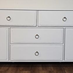 New assembled White dresser with some damage as shown in pictures.  
