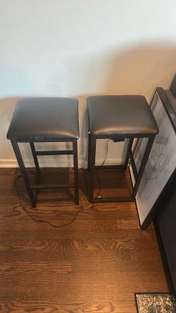 Two black stools