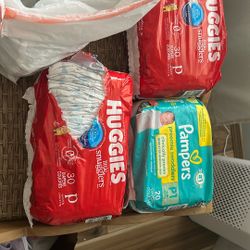 Over 80 Preemie Diapers!! 