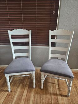 2 distressed painted chairs