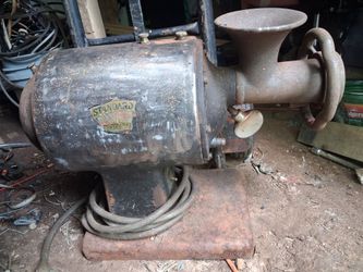 Vintage electric commercial meat grinder..