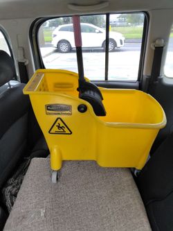 The bucket is fine but the mop ringer is missing a piece as is
