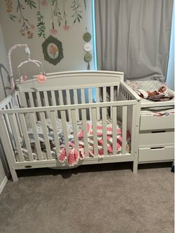 Crib with changing table