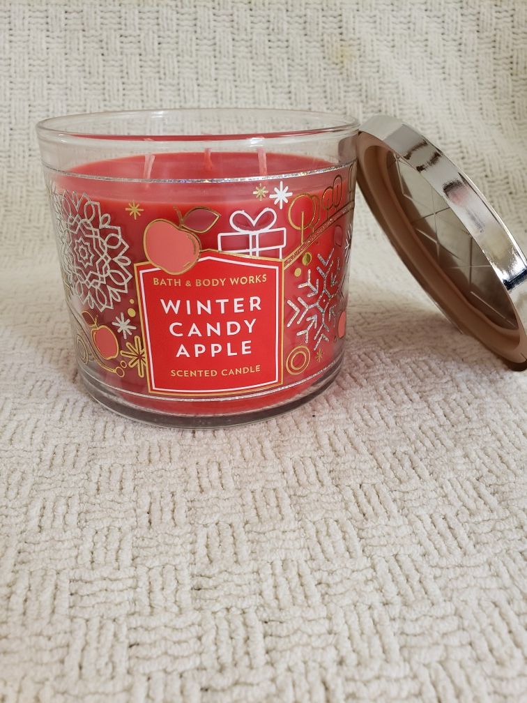 New, 3 wick winter candy apple candle from Bath and Body Works.