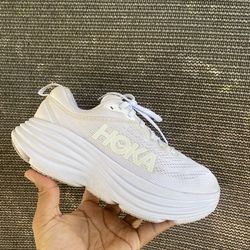 Women's Hoka Bondi 8 in the sleek 'White' colorways.